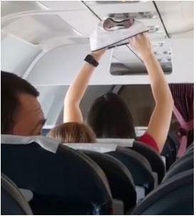 Woman Seen Drying Her Panties With The Overhead Air Vent On A Airplane