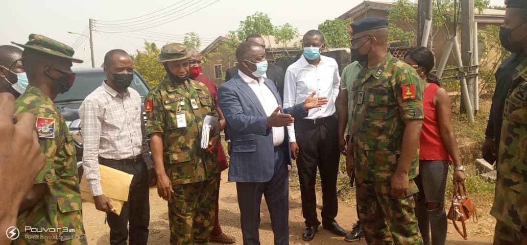 PHOTO CAPTION:Dr.Victor Onukwugha of Bauhaus International Limited on suit during the official handing over of the site for Army Valor Gardens Estate, Obinze near Owerri by Major General T.T Numbere and Brigadier General I.Y Tukura looking. Picture by EVEREST EZIHE