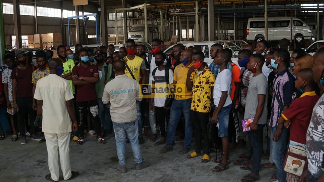 The newly inducted students touring the factory