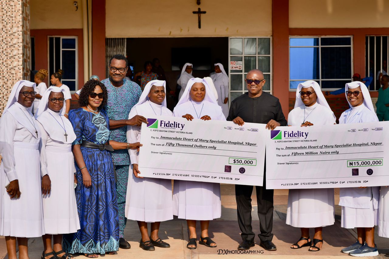 Peter Obi presenting cheque to Sisters at Immaculate heart specialist hospital